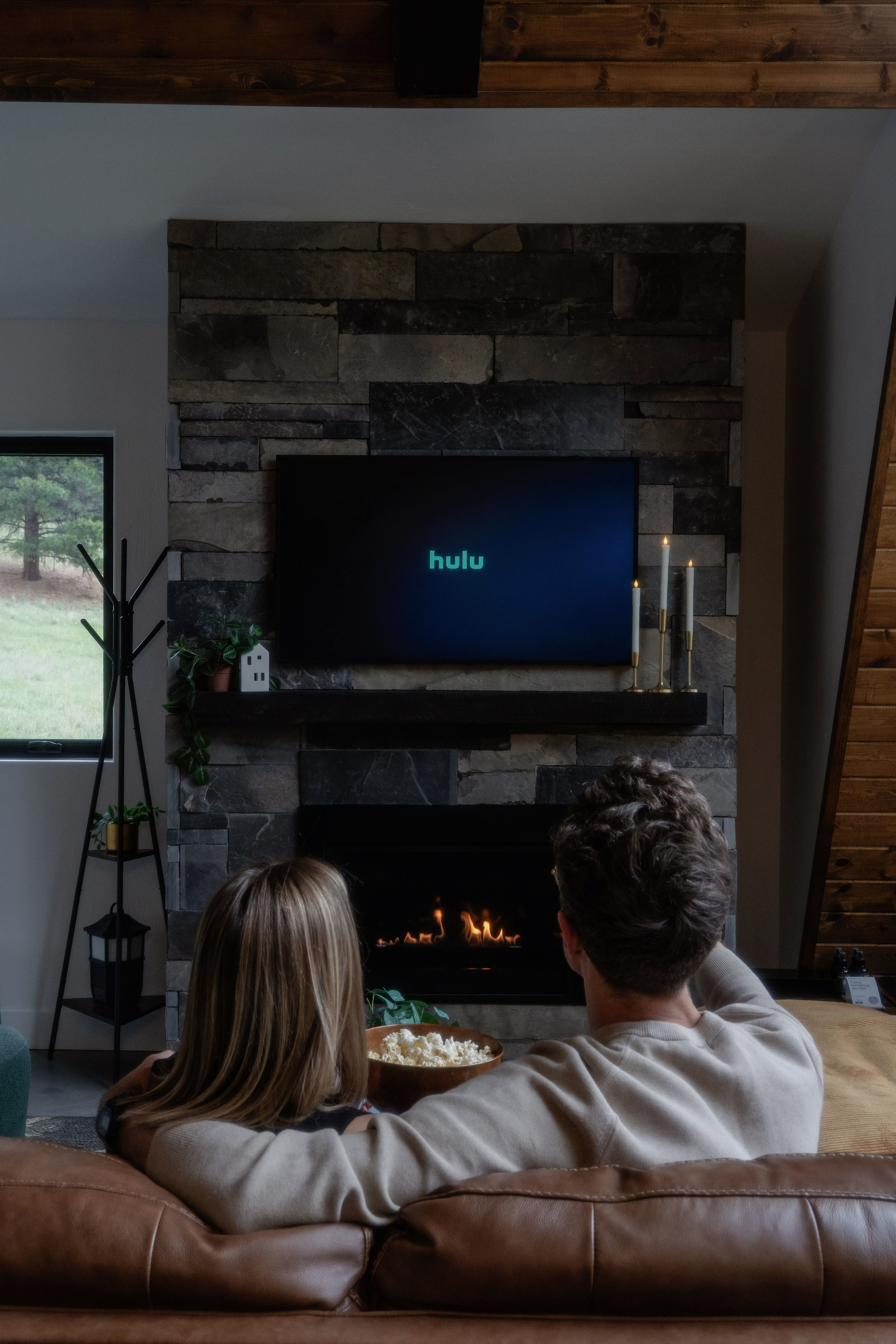 Relaxing by the fireplace and smart TV