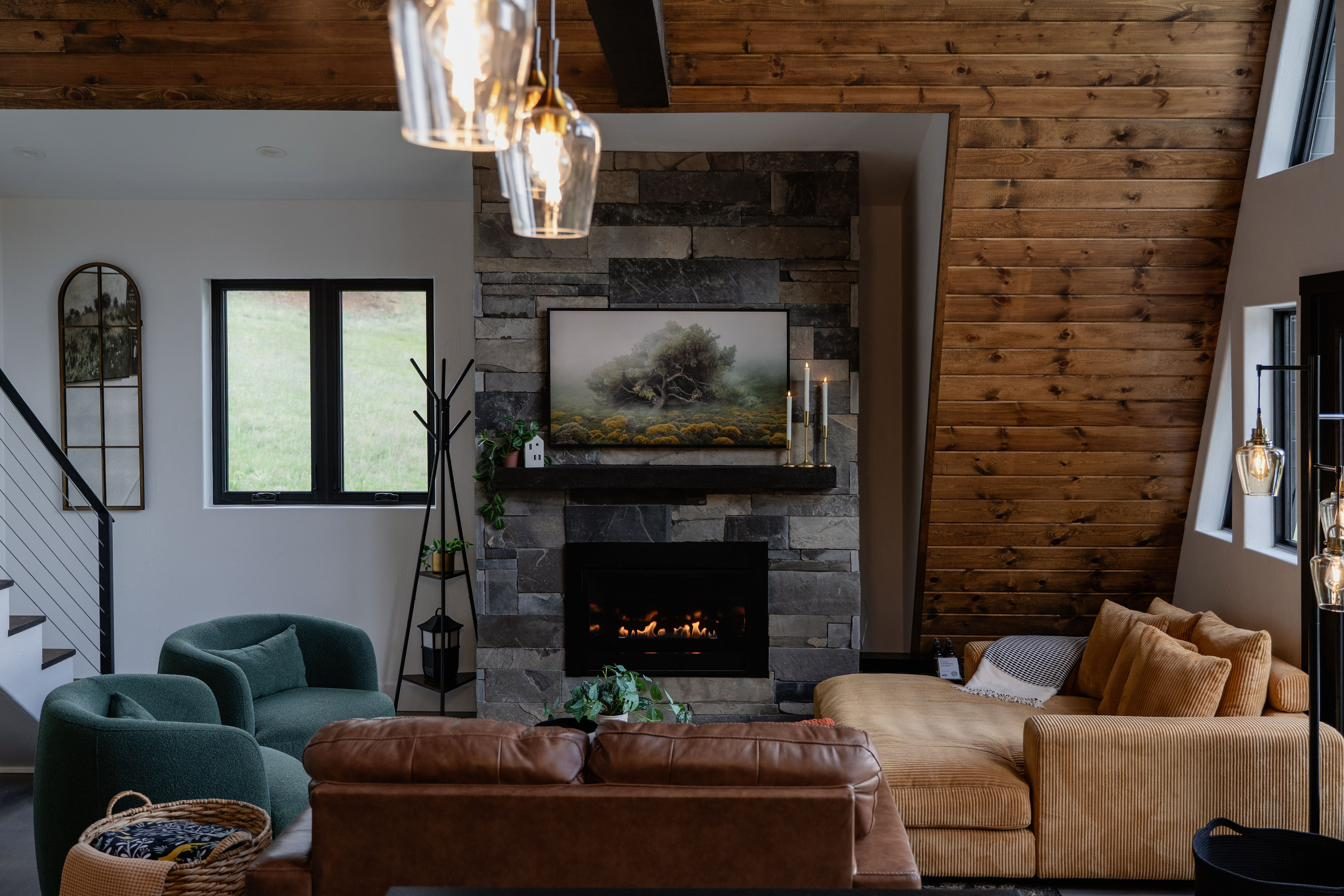 Cozy living room with leather sofa and fireplace
