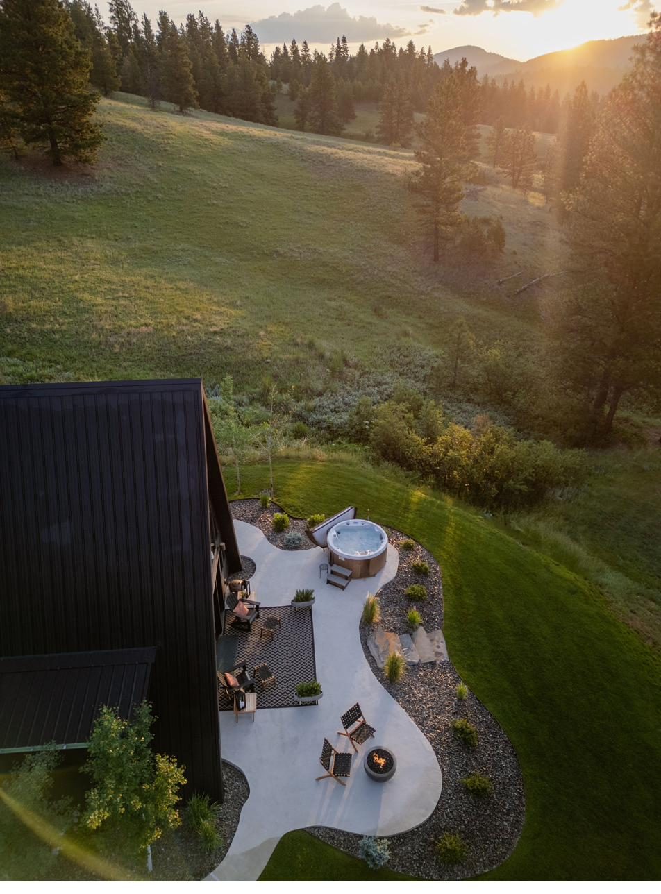 Patio and hot tub at golden hour from above